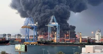 Fireball blankets port city with thick black smoke as paramilitary unleashes drones, Sudan says