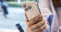 Apple warns iPhone users to update software after mass hacking campaigns