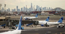 Driver on N.J. Turnpike hurt as United plane hits pole on approach to Newark airport