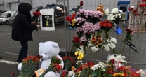 Survivors and mourners express shock and horror one day after Russian concert attacks