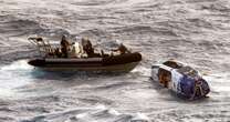 Australian navy rescues adventurer after cyclone while rowing across Pacific