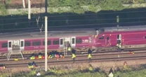 1 person killed, dozens injured after two trains collide north of London