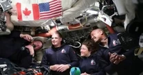 Tom Costello speaks with Artemis II crew during their moon mission