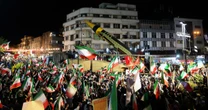Iran displays apparent ballistic missile at Tehran rally
