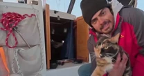 Man and his cat go viral for videos of their sailing adventure around the world