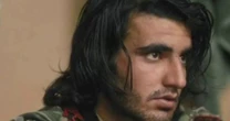 Widow sues National Geographic alleging his appearance in film caused his murder