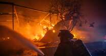 California wildfire scorches abandoned cars left behind by evacuees