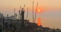 Wildfire destruction seen after sunrise in Malibu and Altadena