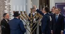 Polish Hanukkah candles relit after far-right fire extinguisher incident