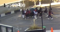 Watch students rescue mother and child trapped under car