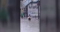 Video shows child’s body carried through Gaza floodwater