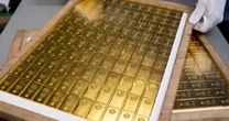 Former CIA officer accused of stashing 300 gold bars in his house