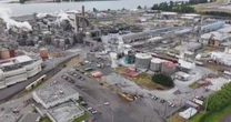 Thousands evacuated from chemical tank threat