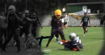 Youth football game brawl leads to mother's arrest for allegedly storming field, kicking player