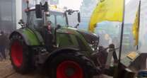 Video shows farmers driving tractors into Brussels as part of a protest