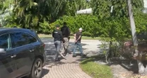 Watch: Robbery suspect caught hiding in Florida reporter's backyard