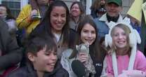 Kids share excitement as balloons are inflated for Macy's Thanksgiving Day Parade