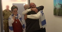 Returned hostage Eitan Mor reunites with his family