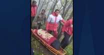 Iranian video shows Red Crescent workers carrying covered body on a stretcher