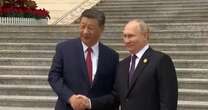 Russia's Putin greeted by Xi Jinping at the start of a two-day visit to China