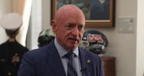 Sen. Mark Kelly says the U.S. government should be ‘more proactive’ about AI scams