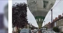 Hot air balloon makes emergency landing in middle of UK neighborhood