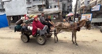 ‘I hope we die and get relief’: Families displaced as Israel attacks Gaza City