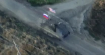 Russian state media shares video of vehicle flying U.S. and Russian flags in Ukraine