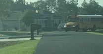 Video appears to show sprinklers aimed at disabled students boarding school bus