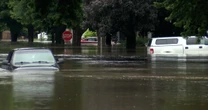 At least 1 person is dead due to flooding near Iowa, South Dakota border