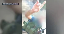 New video shows American and two other hostages during Hamas abduction