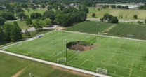 'It kind of all went at once': Sinkhole swallows Illinois soccer field