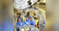 Pediatric brain surgeon takes on healthcare giant