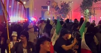 Los Angeles authorities dispersed crowds with flash-bangs, pepper balls