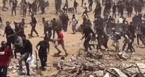 Dozens killed at Gaza aid site after shots fired into crowd