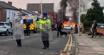 Far-right protesters clash with police in English town where three children were stabbed to death