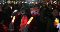 South Korean protesters demand president's impeachment with light sticks and K-pop