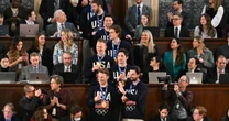 Trump brings the U.S. men's hockey team into the chamber during his State of the Union speech