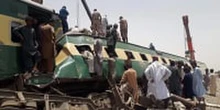 Pakistani train smashes into derailed carriages, killing 33