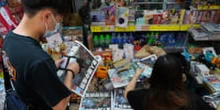 Hong Kong police arrest Apple Daily journalist at airport days after newspaper's closure