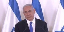 Israeli Prime Minister Netanyahu lashes out at opponents after coalition deal