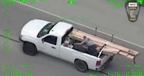 Man Throws Wood Boards at Police During High-Speed Chase
