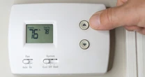 How to lower your home heating bill while still staying warm