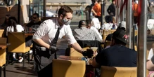 Even for vaccinated people, now is the time for masks and testing, health experts say