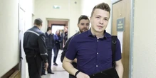 Video of Belarus dissident journalist shown as E.U. imposes sanctions