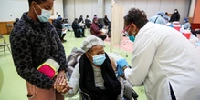 A 'vaccine hustler' and a 'superhero' are getting Americans vaccinated