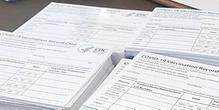 Covid-19 vaccination site worker accused of stealing blank vaccine cards