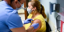 U.S. says people should wait 8 months before a 3rd vaccine dose. But some aren't holding off.