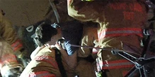Video shows firefighters rescuing boy from rubble of Miami Beach building collapse