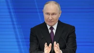 Putin urges Russians to stop drinking, keep making babies